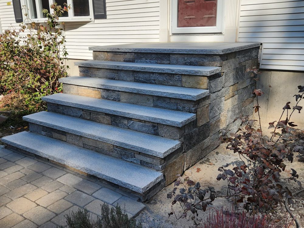 Our Step Installation service offers homeowners expertly crafted, durable steps tailored to enhance the safety and elegance of any entrance, seamlessly blending functionality with your home’s aesthetic appeal. for Graziano Empire in Billerica, MA