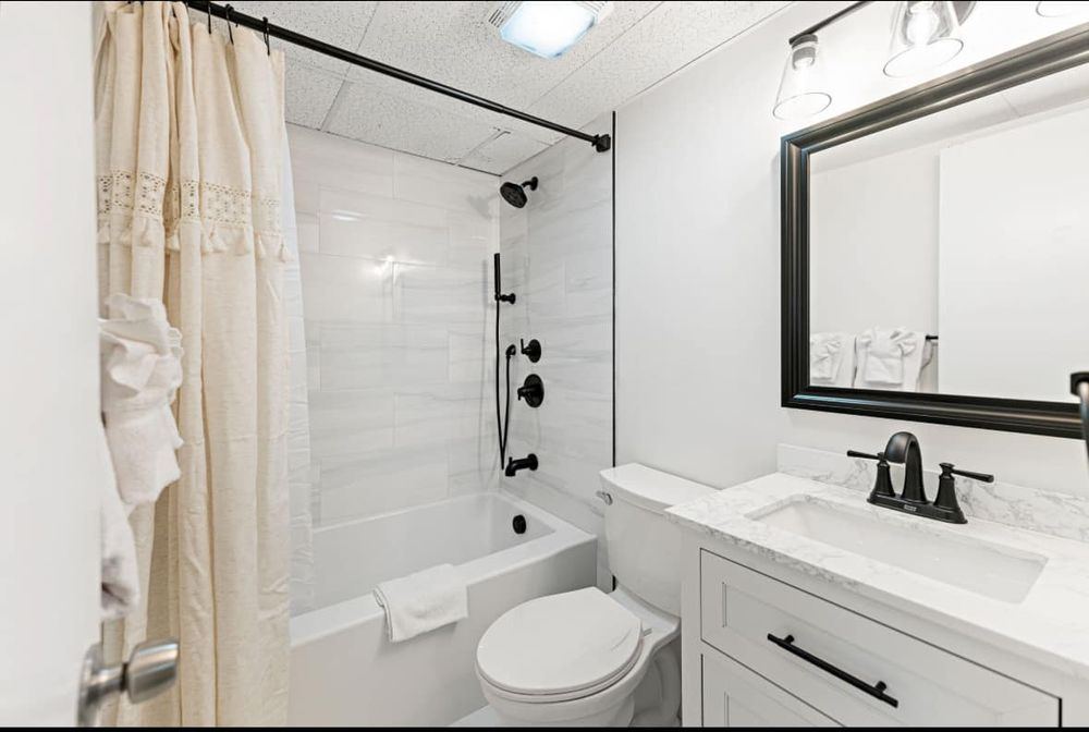 Our tiling service seamlessly transforms any space with precision and creativity using high-quality tiles to enhance durability and beauty in your home's floors or walls throughout construction and remodeling projects. for Mid Atlantic Home Improvements in Ocean City, MD