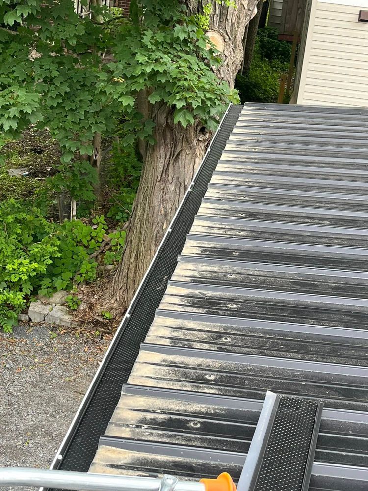 Protect your home with our Gutter Guards service that prevents clogs and ensures efficient water flow, reducing maintenance and safeguarding against damage. Enjoy peace of mind with a hassle-free gutter system. for Claus Seamless Solutions in Dolgeville, NY