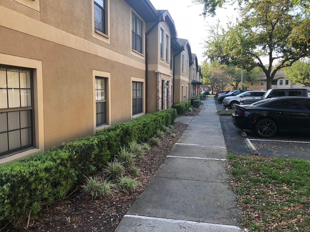Our commercial landscaping service enhances your property's appeal, creating vibrant, sustainable outdoor spaces with professional maintenance and design tailored to elevate aesthetic value and functionality for businesses of any size. for Genesis Landscape Services in Spring Hill, FL