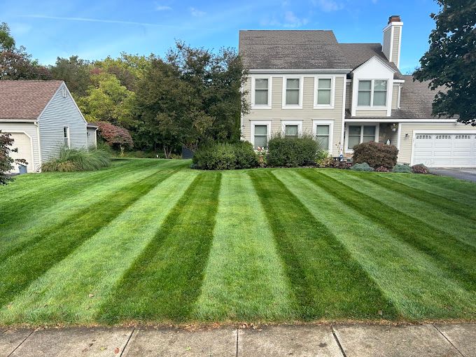 Our professional mowing service ensures your lawn remains beautifully manicured, healthy, and lush. With precision cutting and timely maintenance, we enhance your landscape’s appearance while saving you time and effort. for Dibs Landscaping LLC in Cheshire, CT