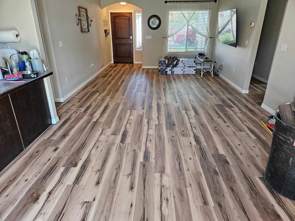 Transform your home with our expert flooring service. From hardwood to tile, we provide high-quality materials and professional installation to enhance the beauty and functionality of your space. for Elk Valley Construction  in Magic Valley, ID