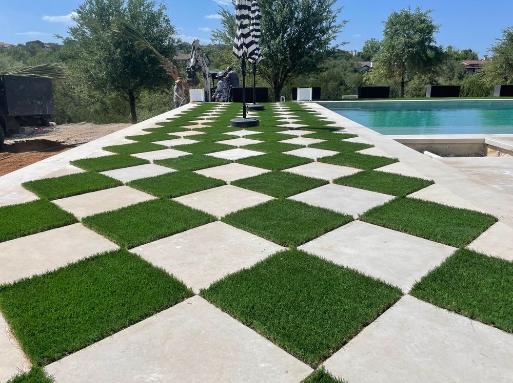 Enhance your outdoor living space with our Artificial Turf service. Enjoy maintenance-free, green grass year-round without the hassle of watering or mowing, perfect for complementing your custom pool oasis. for Just Great Pools in Lakeway, TX
