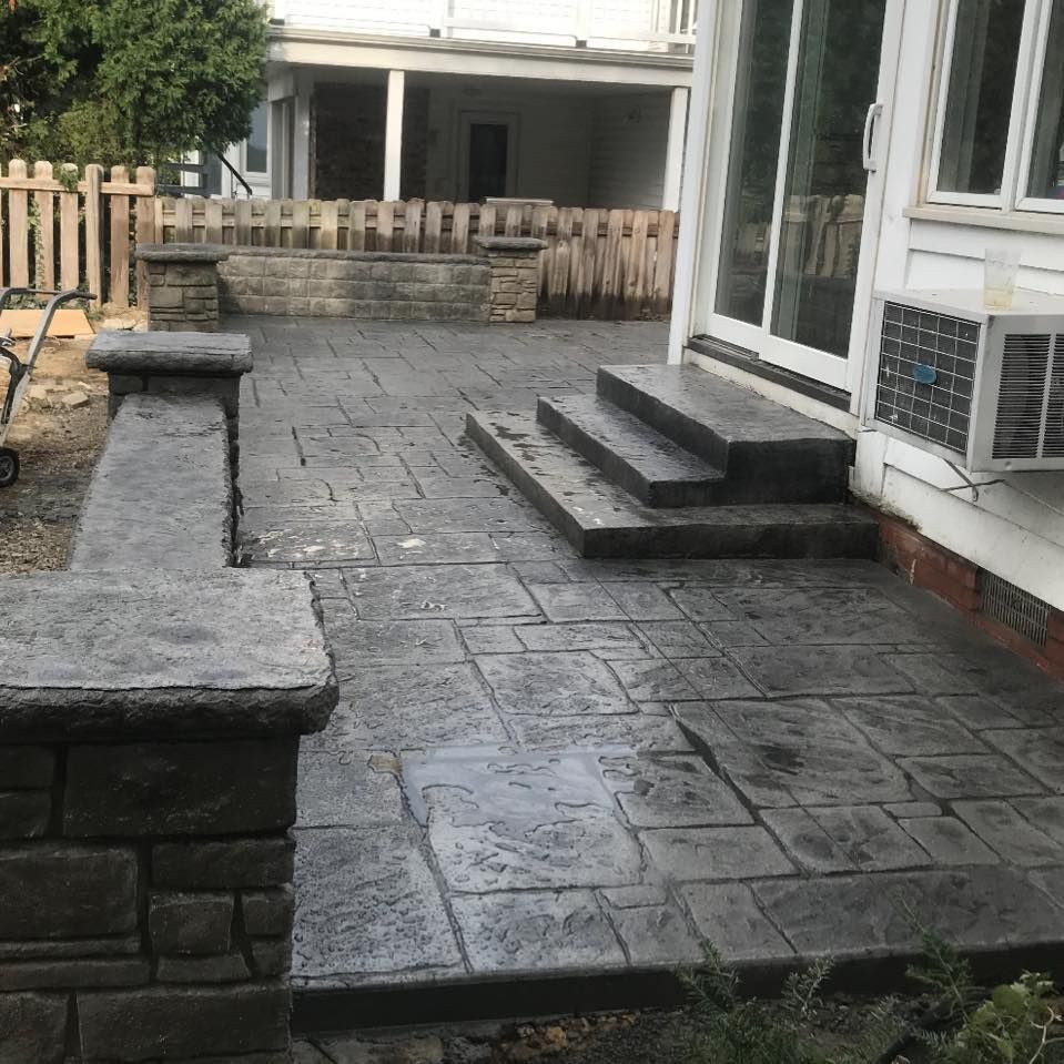 Transform your outdoor spaces with our Stamped Concrete Installation service, offering a stylish and durable solution that mimics natural stone or brick, enhancing your home's appeal with lasting beauty and strength. for Lake Erie Companies in Grand River, OH