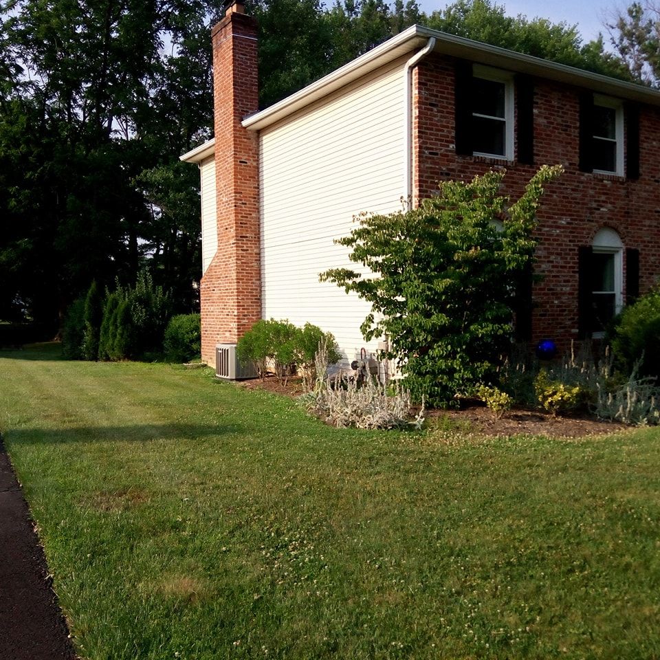 Enhance your lawn's appearance with our comprehensive Lawn Cutting & Maintenance service, offering precise mowing, edging, and seasonal care to ensure a lush and healthy landscape that complements your hardscaping beautifully. for Russo’s Landscaping & Tree Removal in Levittown, PA
