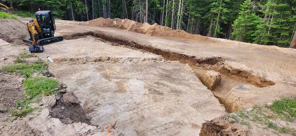 Our trenching service expertly creates precise ditches for utility lines, drainage systems, and landscaping needs. We ensure minimal disruption to your property while delivering efficient and reliable results you can trust. for Weingart Enterprises in Newman Lake, WA