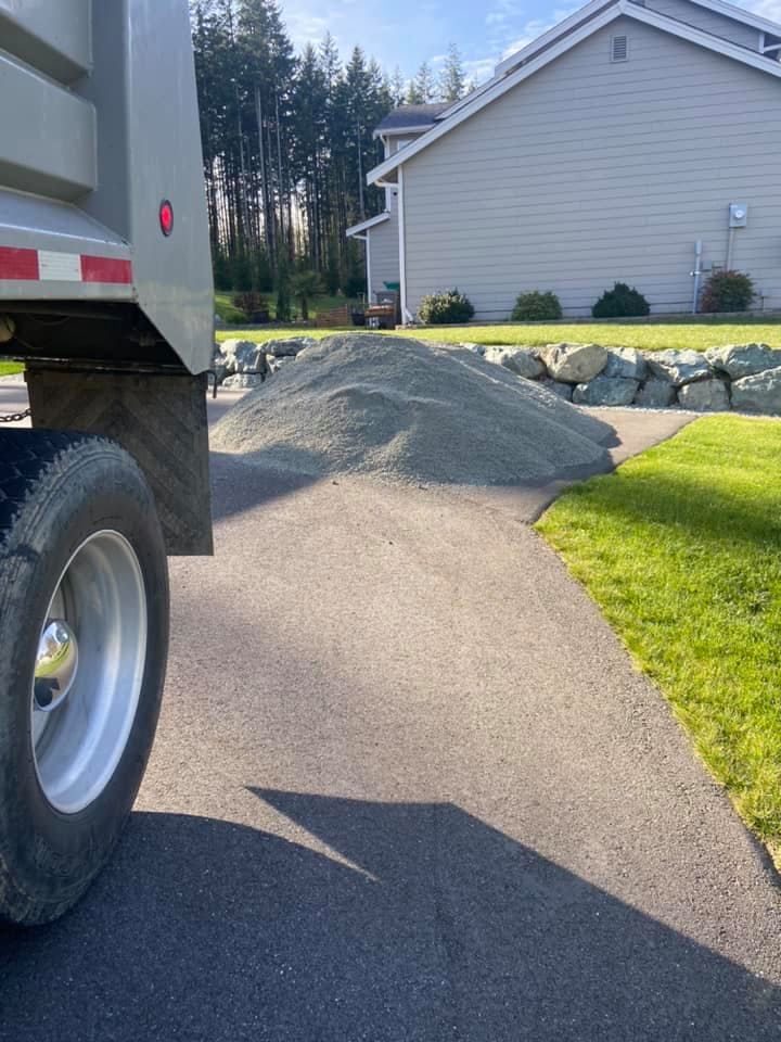 Our Gravel Hauling service can efficiently transport large quantities of gravel to your property, ensuring timely deliveries and precise placement for all of your landscaping and construction projects. for AR Trucking & Excavation LLC in Stanwood, WA