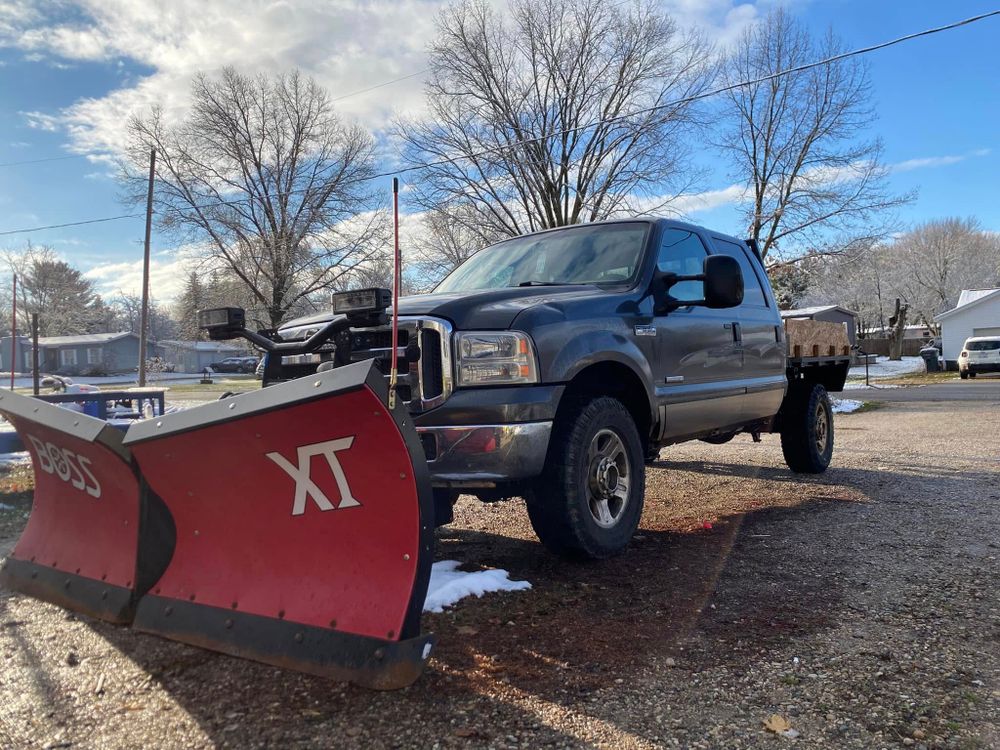 Our Snow & Ice Management service ensures your property remains safe and accessible during winter with prompt snow removal, efficient de-icing solutions, and proactive maintenance to prevent slip hazards. for Land Movers in Kalamazoo County, MI