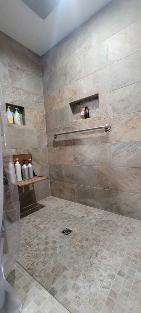Transform your space with our expert bathroom renovation service, enhancing functionality and style through meticulous design, high-quality materials, and professional craftsmanship for a luxurious, personalized experience. for Middle Man Construction in Fall Branch, TN