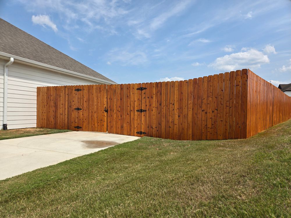 Fence staining for Patriot Fence  in Oakland, TN