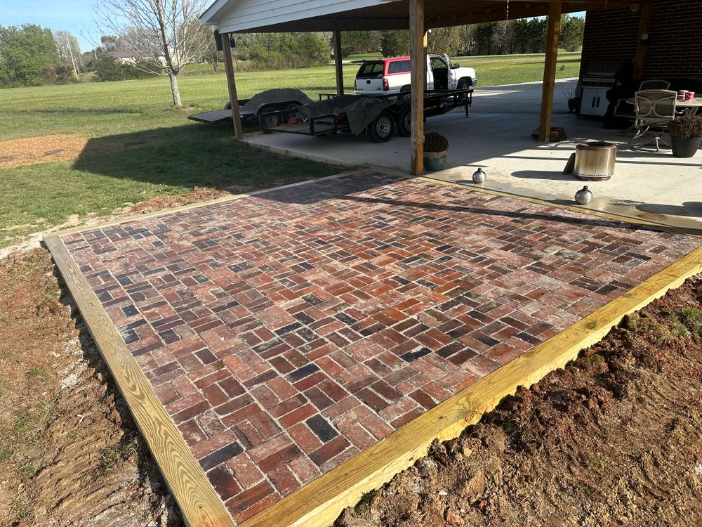 Our Pavers service transforms your outdoor space with durable, stylish, and versatile paving stones that enhance the beauty and functionality of your property for a lasting investment in quality design. for Mike Feagin Construction in Lewisburg, TN