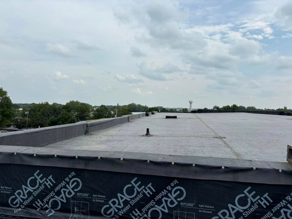 We offer professional roofing replacement services to enhance the aesthetic appeal and structural integrity of your business, ensuring a durable and reliable solution for protecting your investment. for Elmcrest Construction in Harris,  MN