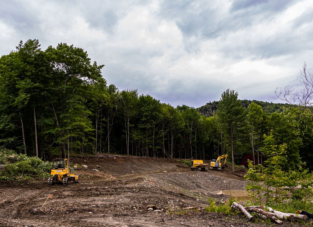 Carving a Pond into a Mountain Side for Andy Naylor Excavation in Johnson, VT