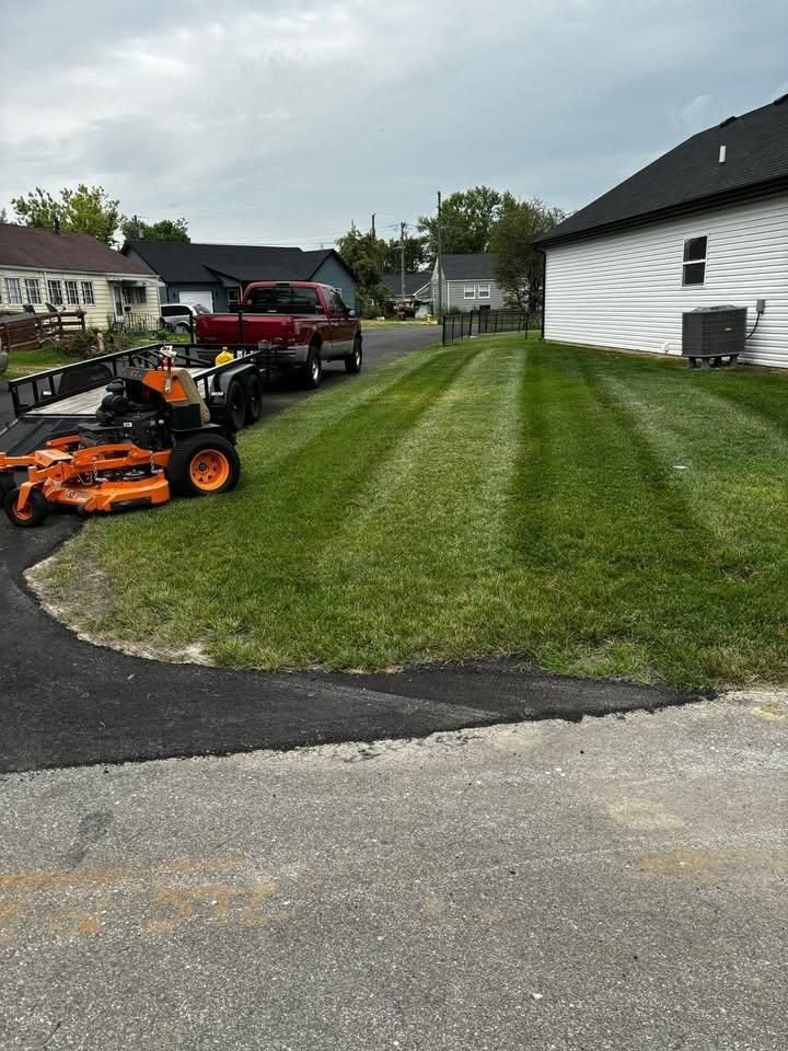 Our professional mowing services ensure a pristine lawn with precise cutting, edging, and trimming, enhancing your home's curb appeal while saving you time and effort for other leisurely pursuits. for EverReady Lawn Co in Charlestown, IN