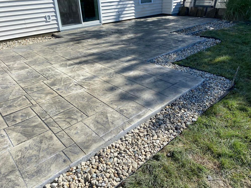 Transform your outdoor space with our expert stamped concrete installation, offering beautiful, durable surfaces that mimic natural stone or brick at a fraction of the cost, enhancing both aesthetics and value. for Harder Than Concrete in Indianapolis, IN