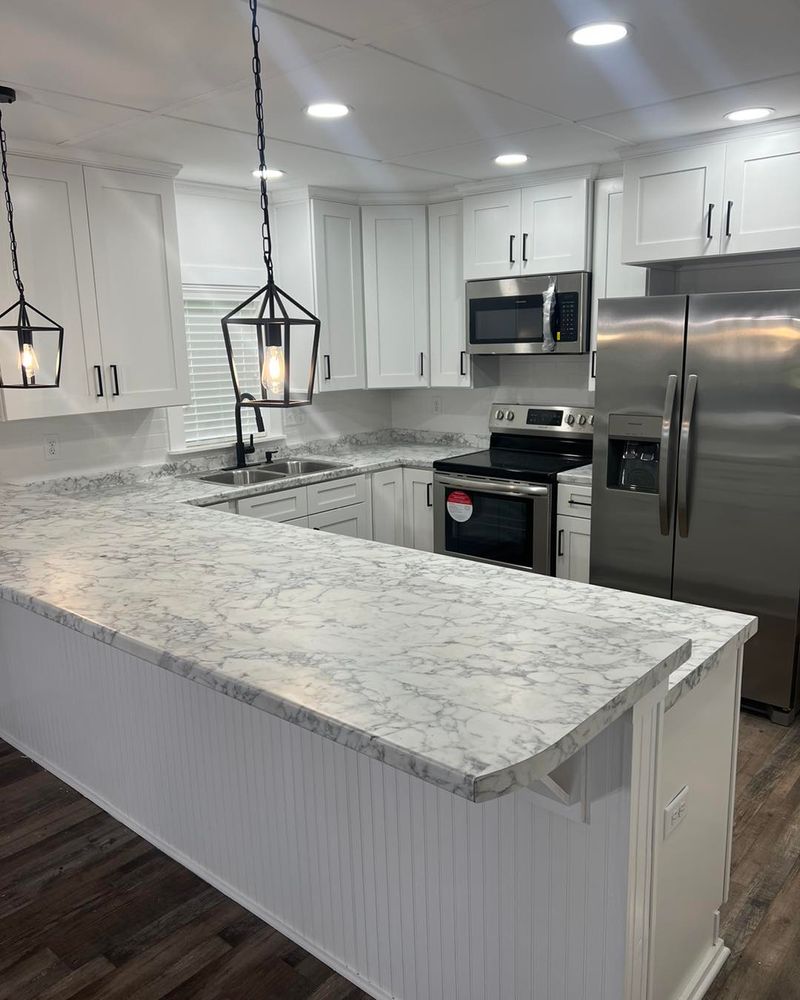 Transform your kitchen with our high-quality laminate countertops, offering durability and style. Perfectly complementing our custom cabinetry and refacing services, we provide an affordable yet luxurious finish to any home improvement project. for Murray Trades in Patterson, GA