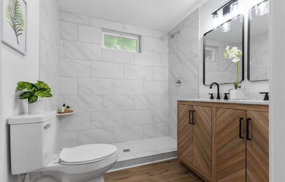 Transform your bathroom into a modern sanctuary with our expert remodeling services, enhancing functionality and style. Trust us to create the perfect space tailored to your needs and preferences. for River City Construction Services in Richmond, VA