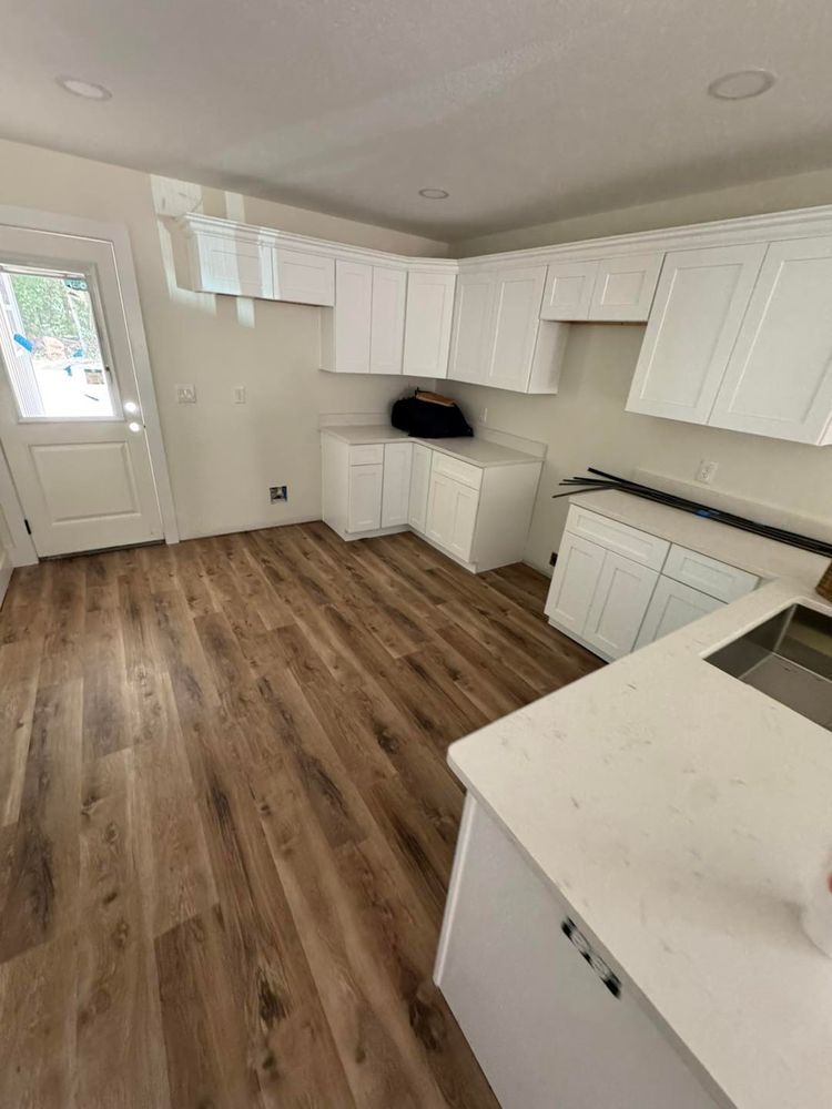 Our hardwood flooring service provides homeowners with expert installation, high-quality materials, and personalized design solutions to enhance the beauty and durability of your home's interior spaces. for Clean Cut Construction in Laurel Hill, FL