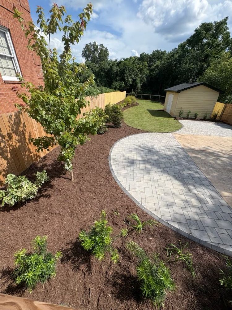 Enhance your garden's health with our professional mulch installation service, preventing weed growth and retaining moisture while adding a polished look to your landscaping. Ideal for maintaining vibrant, thriving outdoor spaces. for Trophy Outdoor Solutions in Lexington, SC