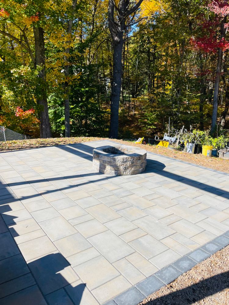 Our Paver patio design service offers homeowners professional expertise and personalized solutions to create stunning outdoor spaces that enhance the beauty and functionality of their homes. for Elyon Construction and Stoneworks LLC in Windsor, CT