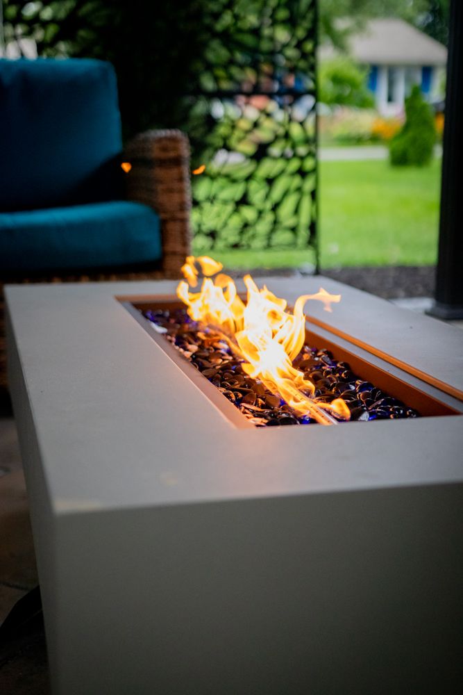 Enhance your outdoor space with our Fire Features, offering custom-designed fire pits and fireplaces that provide warmth, ambiance, and a stunning focal point for any home landscape. for Sunstone Construction in Oakland County, MI