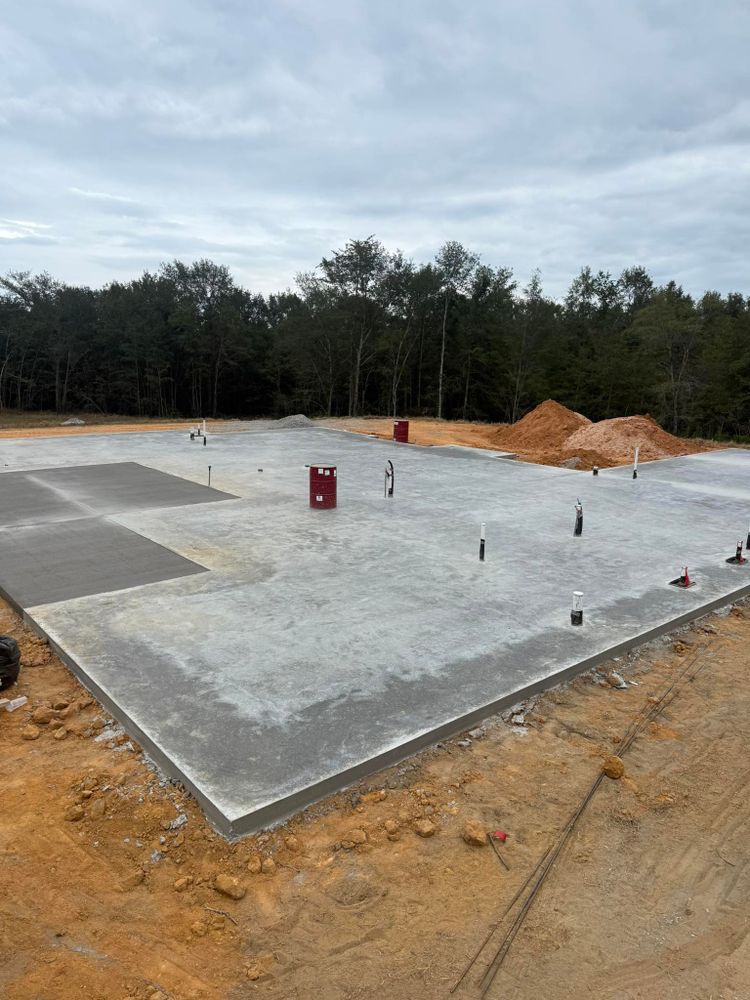 Our Concrete Slab Construction service offers homeowners expertly crafted, durable slabs perfect for patios, driveways, or foundations. We ensure precision and quality using the latest techniques to meet your specific needs efficiently. for 360 Grading and Concrete in Bremen, GA