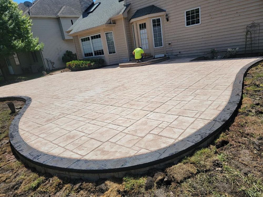 We offer stamped concrete installation to enhance your home's aesthetic appeal with customizable patterns and colors, providing a durable and cost-effective alternative to traditional materials like brick or stone. for CLC Construction in Maple Park,, IL