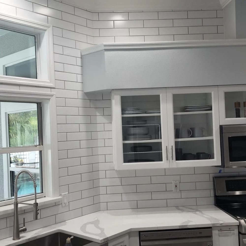 Transform your kitchen with our expert backsplash tiling service. We provide precise installation and a wide selection of materials, adding style and functionality to enhance the heart of your home. for Elite Custom Tile Installations in Ocala, FL