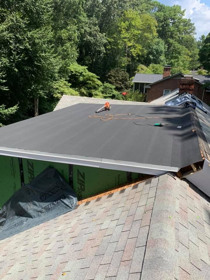 Our Roofing Replacement service can help improve the look and function of your home's roof. We use high-quality materials and experienced professionals to get the job done right. for Rise Roofing NC in Cary, NC