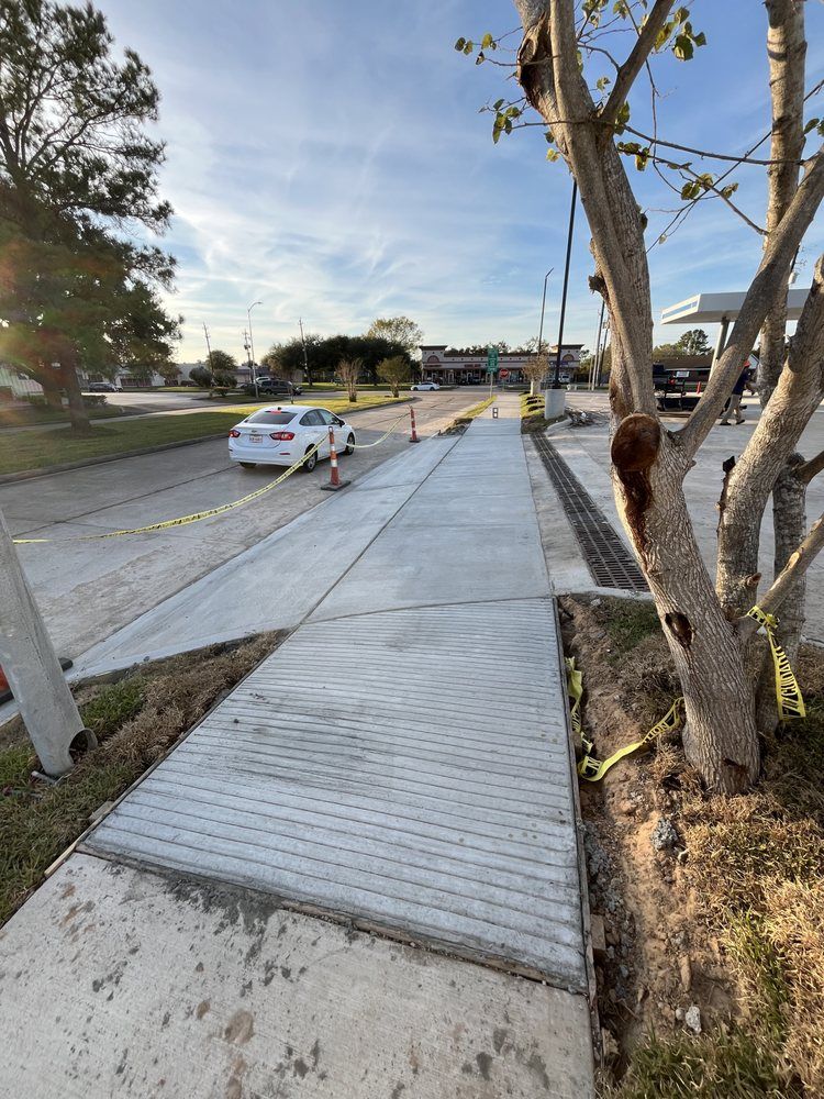 Transform your home's curb appeal with our professional sidewalk installation service. We ensure durable, attractive concrete walkways that enhance safety and aesthetics, tailored to your property's unique needs and style. for South Coast Concrete n Demolition in Alvin, TX