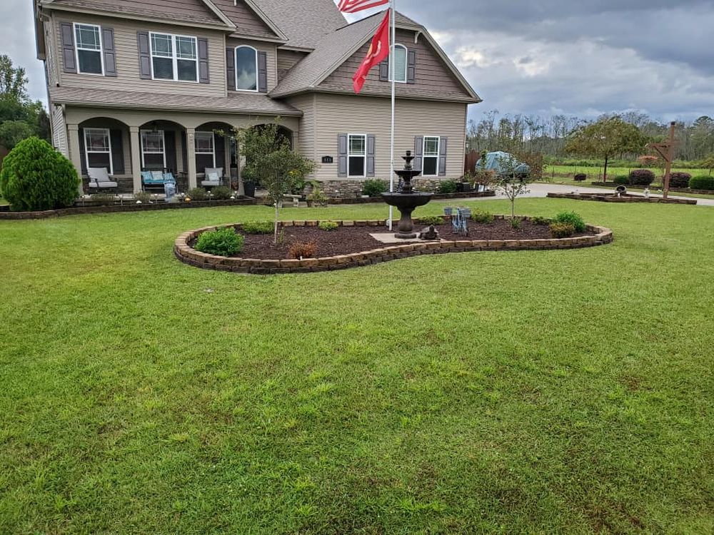 Mowing for All in One Landscaping in Jacksonville, NC