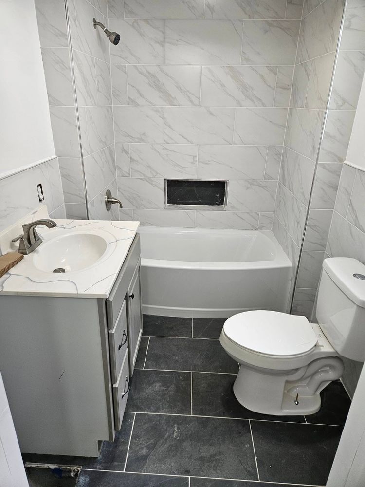 Transform your bathroom into a modern oasis with our expert renovation services. We deliver customized designs, quality materials, and skilled craftsmanship to elevate both functionality and style in your home. for Branch Construction in Pittsburg, PA