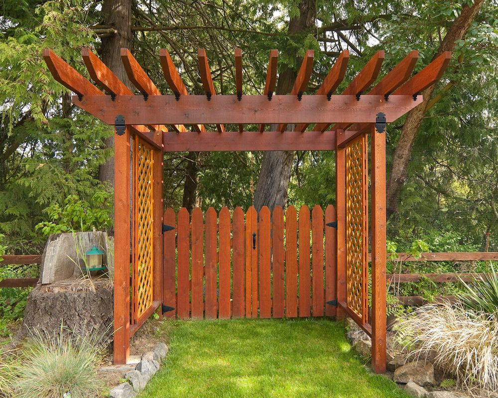 Our Gate Pergola service offers beautiful, durable pergolas installed at the entrance of your property, enhancing the overall aesthetics and functionality of your fencing. for Azorean Fence in Peabody, MA