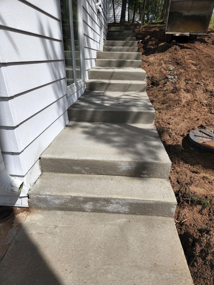 Transform your home with our expert stair design and installation services. We offer durable, stylish concrete solutions that seamlessly blend functionality and aesthetics, enhancing the safety and beauty of your space. for TC Concrete LLC in Kaukauna, WI