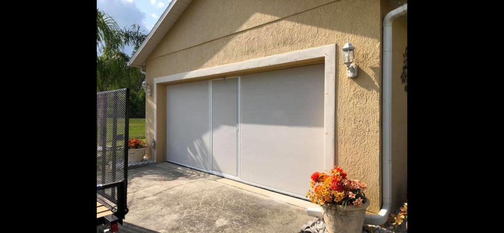 Enhance your home's functionality with our expert Garage Door Screen Installs, providing seamless outdoor living spaces while keeping bugs out. Enjoy fresh air and natural light in any season. for Garage Screen Door Solutions in Lakeland, FL