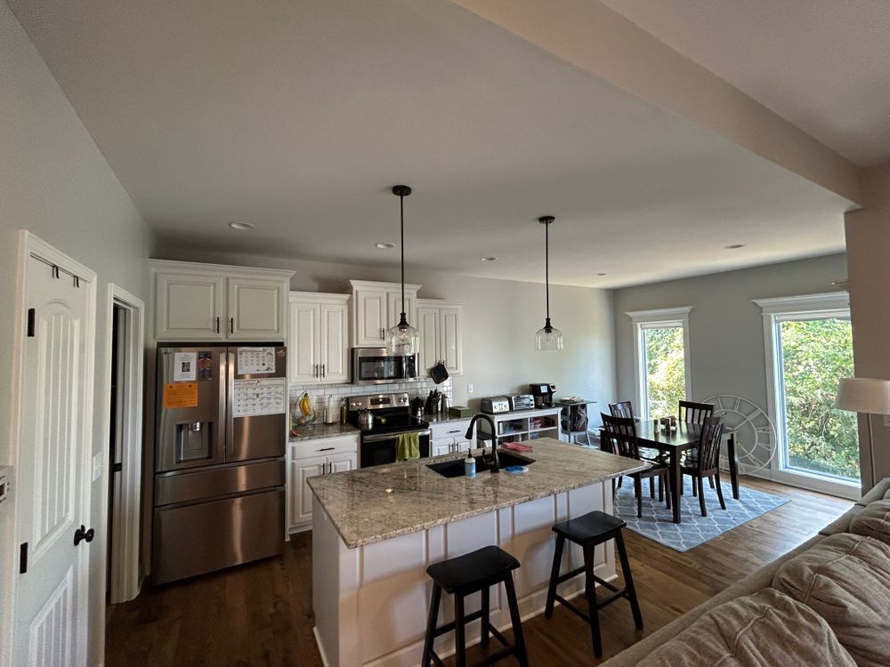 Revitalize your kitchen with our expert cabinet refinishing service, offering sleek finishes and updated aesthetics, tailored to breathe new life into your space without the cost of full replacement. for Higgins Heartland Painting & Remodel in Grain Valley, MO