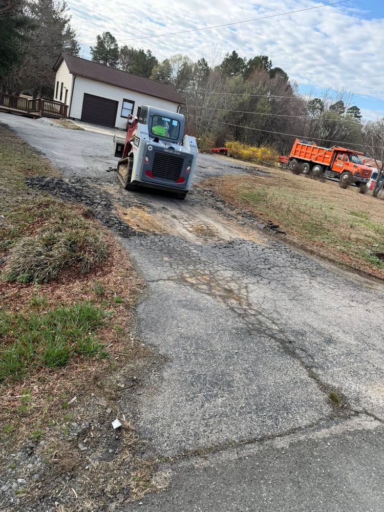 Enhance your property's curb appeal with our expert Commercial Paving services. We deliver durable, high-quality asphalt solutions ensuring seamless installation and long-lasting performance tailored to meet your specific needs. for Gus’s Paving and Sealcoating in Lynchburg, VA
