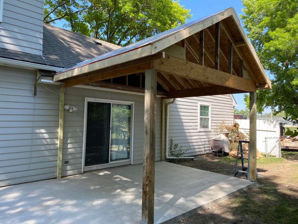 Our deck & patio installation service offers homeowners beautifully crafted outdoor spaces that enhance your property’s aesthetic and functionality, providing a perfect setting for relaxation and entertainment right in your backyard. for Midwest Framing in Lawrence, KS