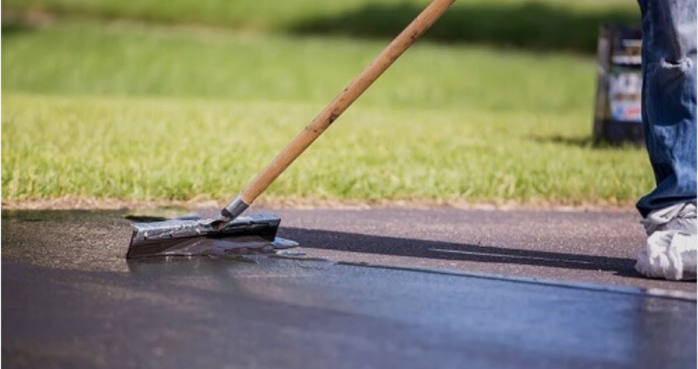 Enhance your home's curb appeal with our sealcoating service, protecting driveways and surfaces from weather damage while ensuring long-lasting durability and a fresh look! for Creekside Property Solutions in Aston Township, PA