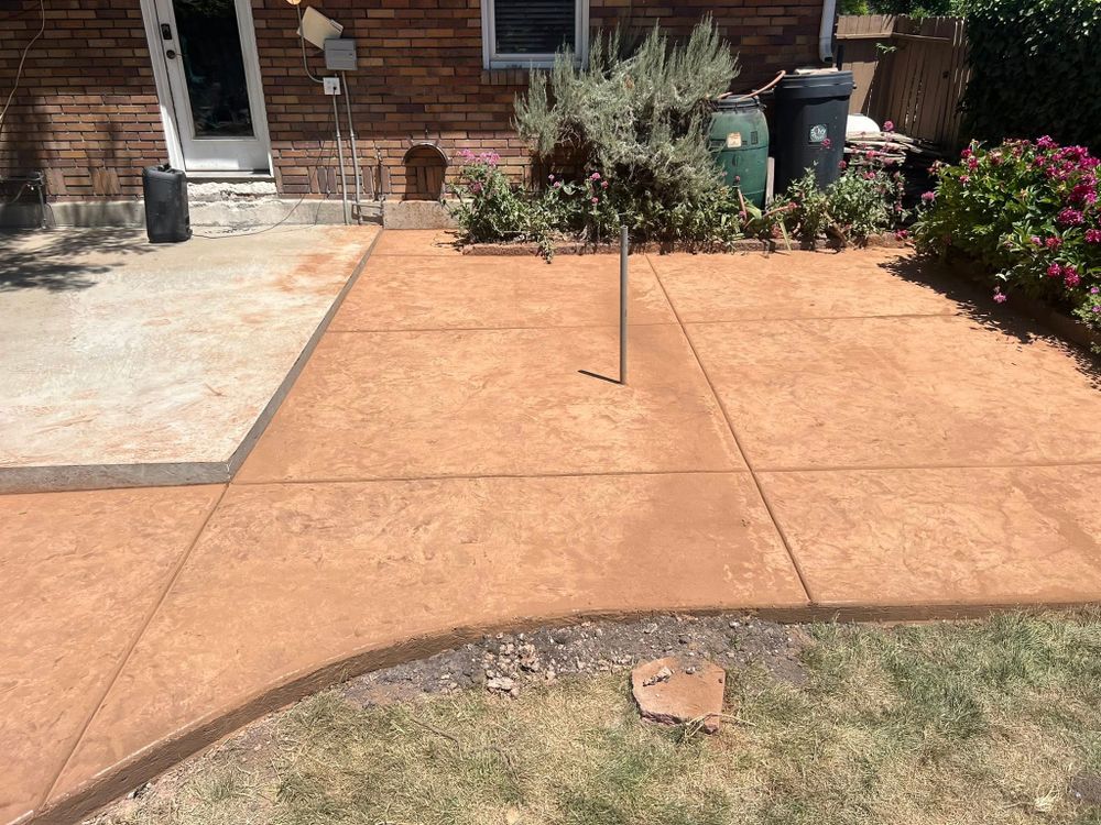 Transform your outdoor spaces with our expert stamped concrete installation, offering durable and visually stunning designs that mimic natural materials, enhancing the beauty and value of your home. for Feiloaki Construction LLC in Farmington, UT