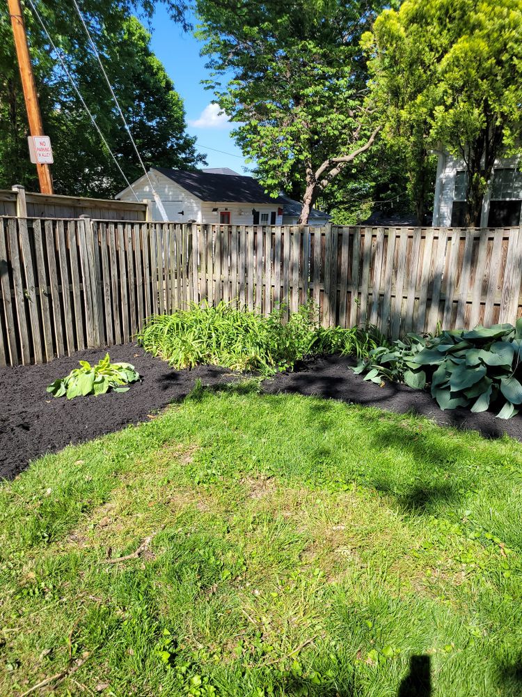 Enhance your landscaped areas with our Mulch Installation service, offering a cost-effective and eco-friendly solution to improve soil moisture retention and weed suppression while adding aesthetic appeal to your outdoor space. for Woody's Tree and Landscaping in Fredericksburg, VA