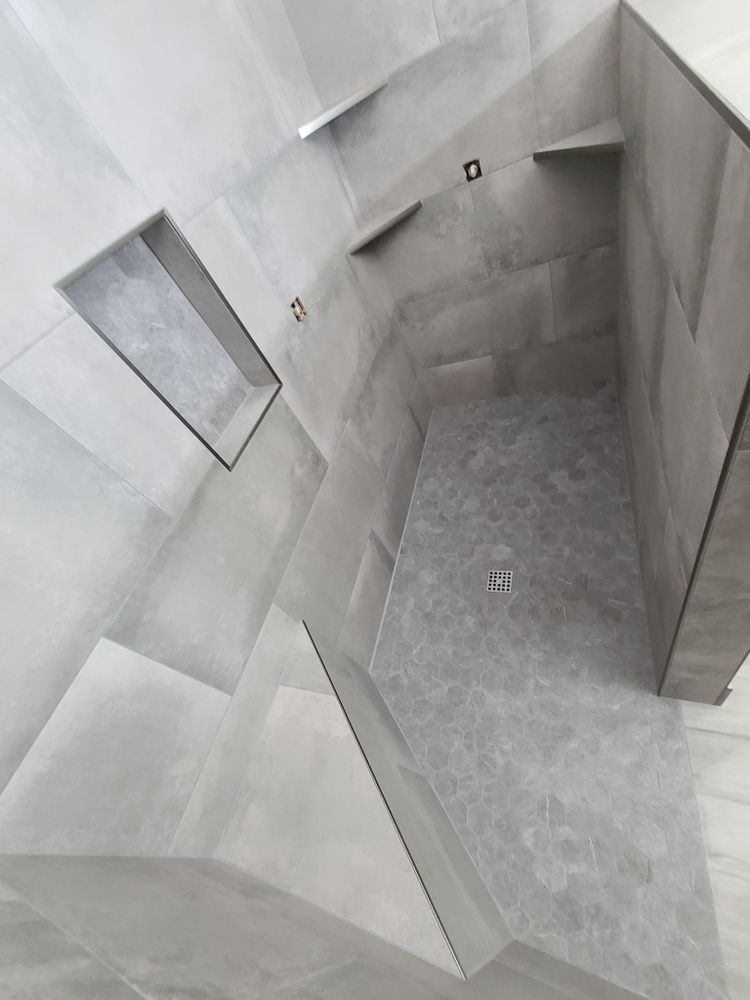 Transform your bathroom with our expert renovation service. We provide stylish tile installations, ensuring high-quality craftsmanship and personalized design to create the perfect sanctuary for your home. for Cox Tile and Stone in Clinton, UT