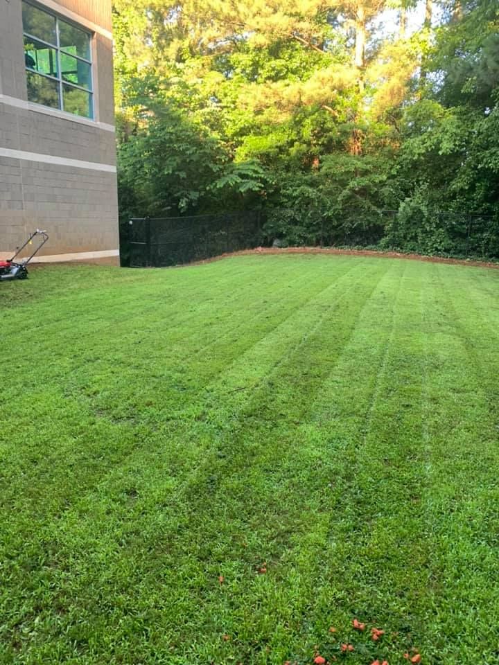 Our professional mowing service ensures your lawn looks pristine, enhancing curb appeal while maintaining optimal grass health with precise cuts and regular maintenance tailored to your landscape's unique needs and growth patterns. for Bega Landscape Services in Atlanta, Georgia