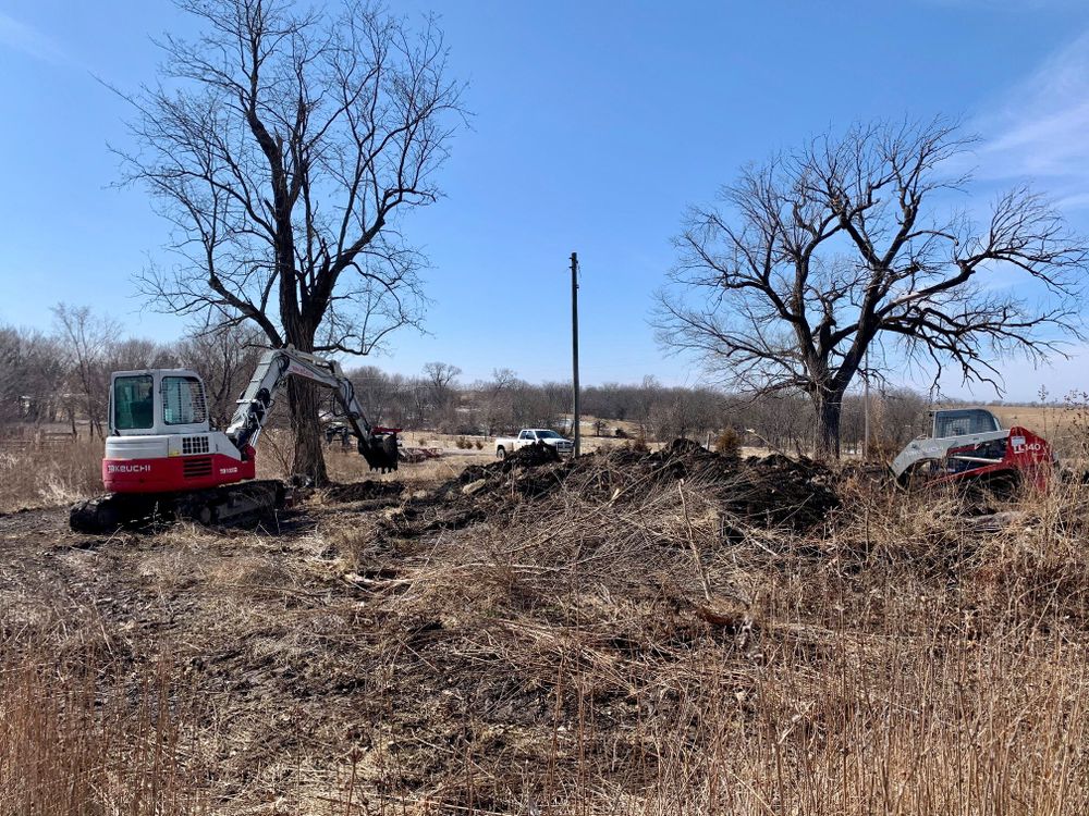 Our Land Clearing and Site Preparation service ensures a smooth start for your project by removing obstacles, leveling the terrain, and preparing the site efficiently to support safe construction activities. for Freedom Excavating in Ludlow, MO