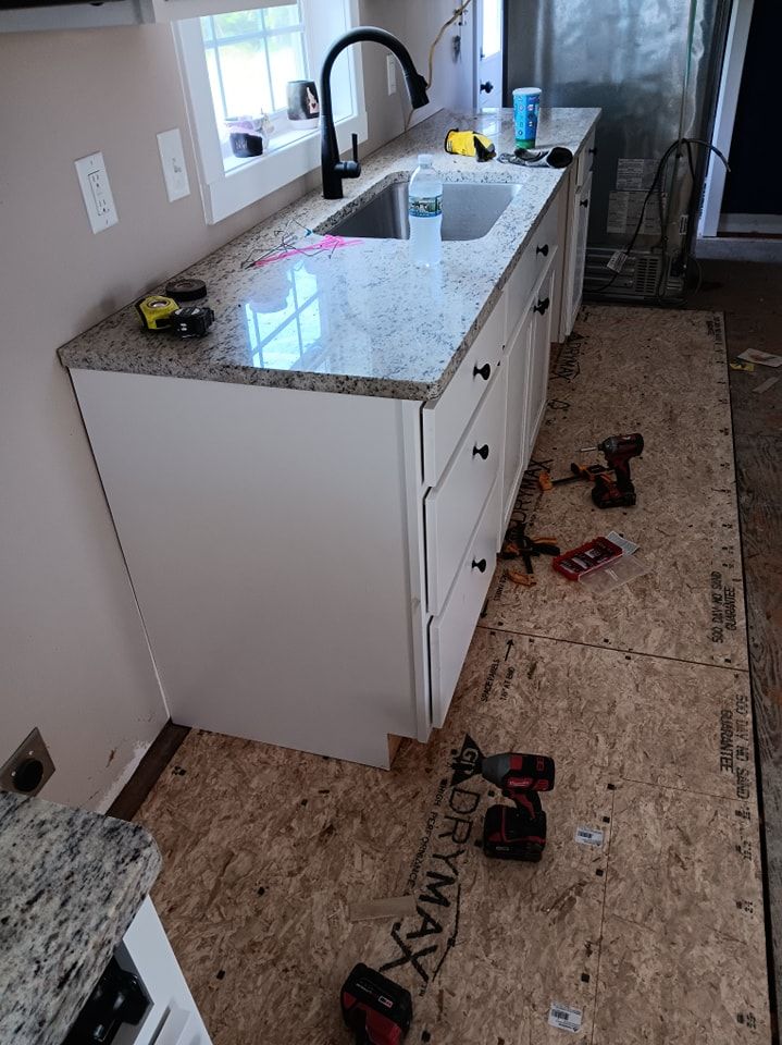 Subfloor repair and Beam Shoring for Dead Tree General Contracting in Carbondale, Illinois