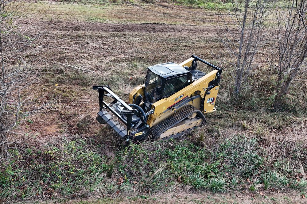 Our Land Clearing service answers what is land clearing by removing trees, brush, stumps, and debris to prepare your property for construction, landscaping, improved access, drainage solutions, and safer usable space. for Grayson Groundworks in Sevierville, TN