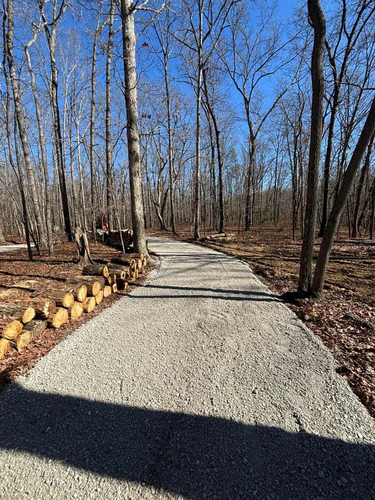 Our driveway installation service includes clearing land to create a smooth, durable surface for convenient access to your home. Enhance curb appeal and functionality with our professional construction expertise. for TD Dirtworks in Tracy City, TN