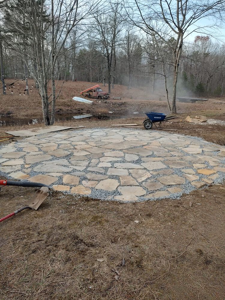 Our patio construction service designs and builds durable, attractive outdoor spaces tailored to your home, lifestyle, and budget, enhancing curb appeal, comfort, functionality, and long-term value with expert craftsmanship. for Starnes Hardscapes & Property Management LLC in Dunlap, TN