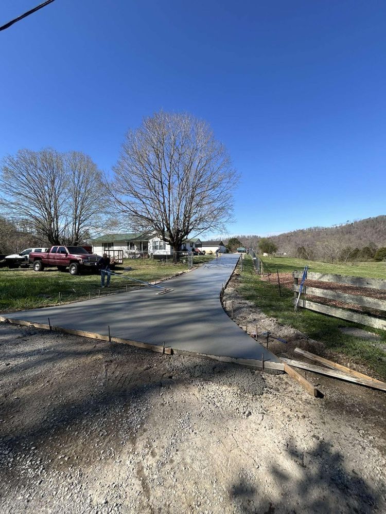Our Roadbeds service provides expertly constructed foundations crucial for driveways and private roads, ensuring durability, stability, and smooth surfaces that enhance property access while increasing overall value. Trust our skilled team for superior results. for F&CO Excavation in Clinton, TN