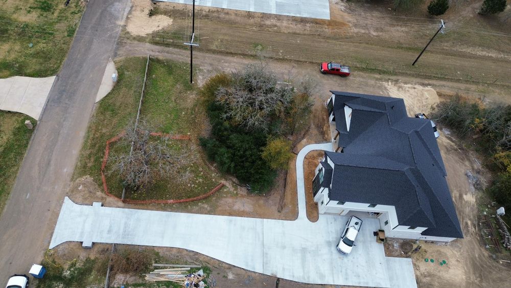 Our Driveways Construction service offers homeowners reliable and high-quality concrete driveway installations, ensuring durability and enhancing the curb appeal of your property. for 4L Concrete Solutions LLC in Bryan-College Station, TX